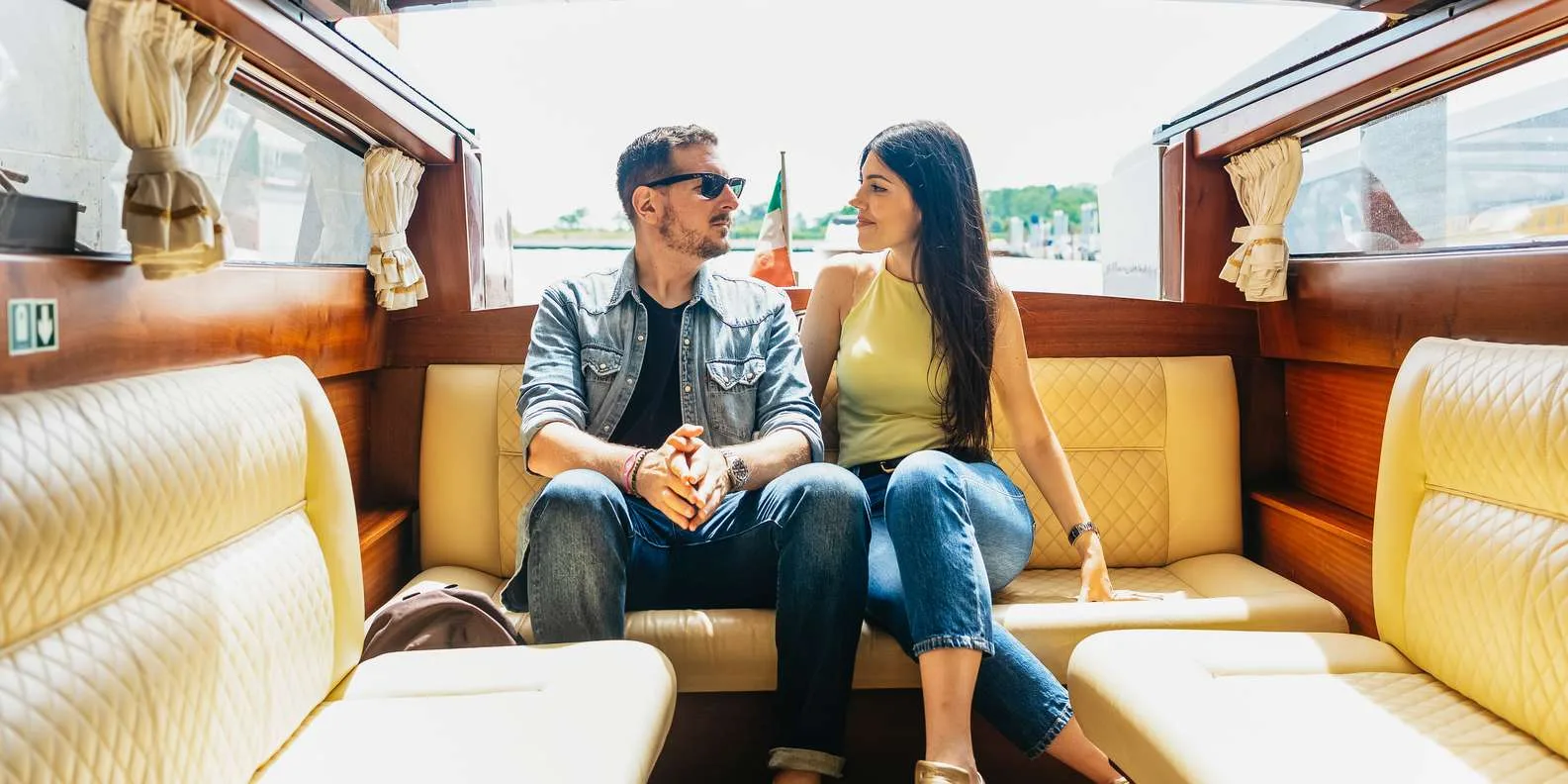 Interior of Venice airport transfer water taxi with comfortable passenger seating
